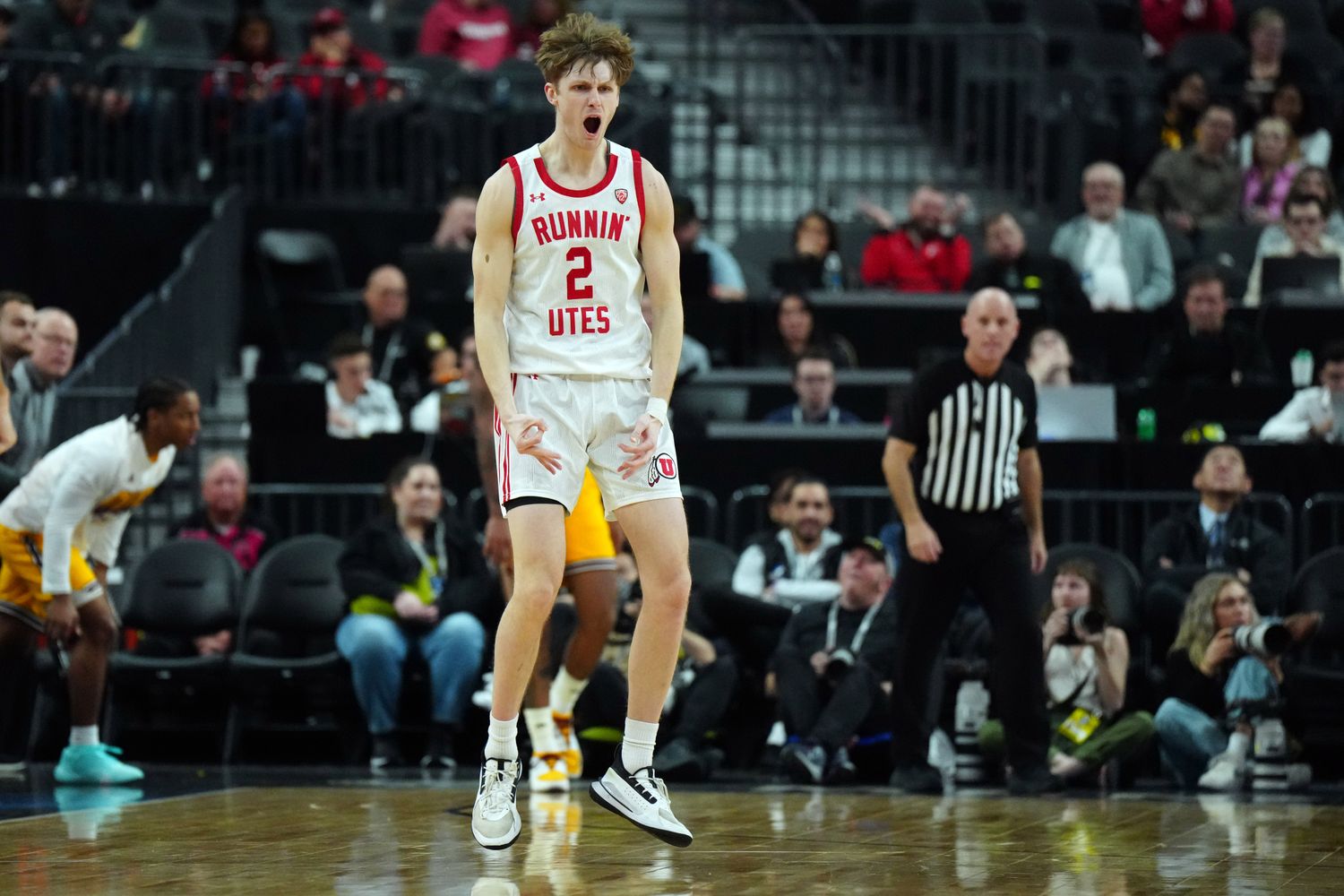 Mar 13, 2024; Las Vegas, NV, USA; Utah Utes guard Cole Bajema (2) celebrates against the Arizona State Sun Devils in the first half at T-Mobile Arena. Mandatory Credit: Kirby Lee-USA TODAY Sports